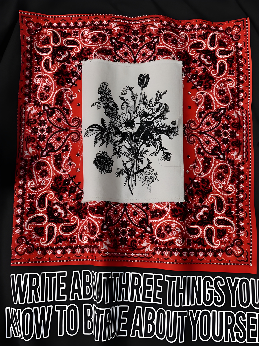 BLACK OVERSIZED T-SHIRT WITH A RED BANDANA AND FLORAL GRAPHIC